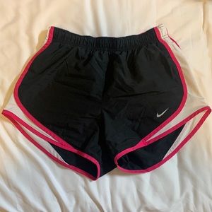 Nike dri-fit shorts size small. Black and pink